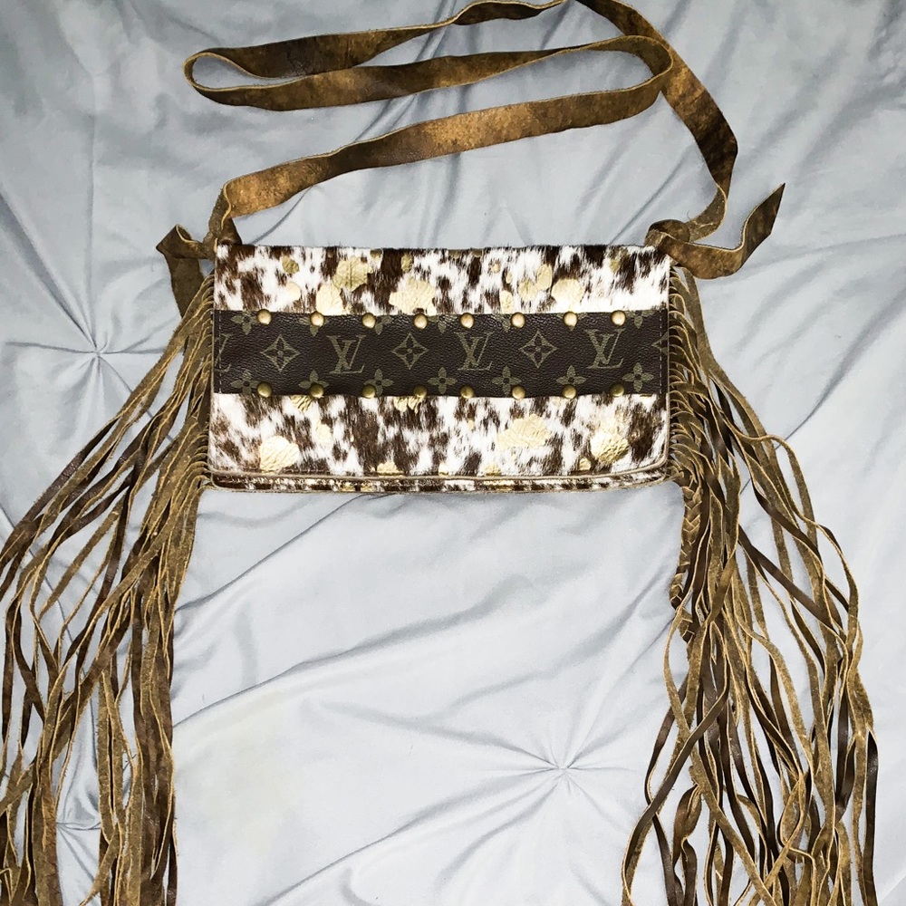 LV accent, cowhide clutch/crossbody